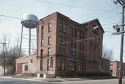 401 N WALNUT ST, a Astylistic Utilitarian Building brewery/distillery/winery, built in Reedsburg, Wisconsin in 1904.