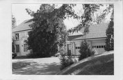 3841 NAKOMA RD, a Colonial Revival/Georgian Revival duplex/two-flat, built in Madison, Wisconsin in 1922.