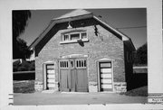 CTH CH, a Astylistic Utilitarian Building fire house, built in Reedsburg, Wisconsin in 1921.
