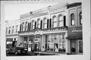 104-108 3RD ST, a Italianate large retail building, built in Baraboo, Wisconsin in 1881.