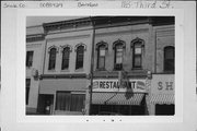 113 3RD ST, a Italianate small retail building, built in Baraboo, Wisconsin in 1888.
