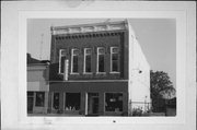 26 E MAIN ST, a Italianate small office building, built in Reedsburg, Wisconsin in 1891.