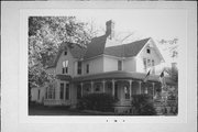 518 E MAIN ST, a Queen Anne house, built in Reedsburg, Wisconsin in 1891.