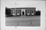 215 N WALNUT ST, a Colonial Revival/Georgian Revival post office, built in Reedsburg, Wisconsin in 1937.