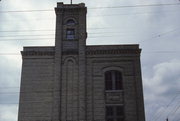 713 S MAIN ST, a Romanesque Revival brewery/distillery/winery, built in Shawano, Wisconsin in 1914.