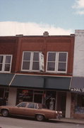 142 S MAIN ST, a Commercial Vernacular grocery store/supermarket, built in Shawano, Wisconsin in 1916.
