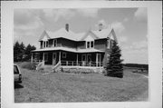 US HIGHWAY 45, S SIDE, 2100' E OF LONE MAPLE RD, a Gabled Ell house, built in Fairbanks, Wisconsin in 1890.