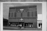 214 S MAIN ST, a Commercial Vernacular large retail building, built in Shawano, Wisconsin in 1903.