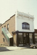212 LOCUST, a Italianate small retail building, built in Hudson, Wisconsin in 1895.