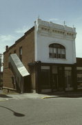 212 LOCUST, a Italianate small retail building, built in Hudson, Wisconsin in 1895.