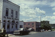 112 WALNUT ST, a Commercial Vernacular large retail building, built in Hudson, Wisconsin in 1857.