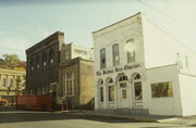 112 WALNUT ST, a Commercial Vernacular large retail building, built in Hudson, Wisconsin in 1857.