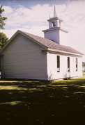COUNTY HIGHWAY J, N SIDE, AT INTERS W/ COUNTY HIGHWAY W, a Greek Revival house of worship, built in Kinnickinnic, Wisconsin in 1868.