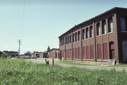 MONROE ST N, a Astylistic Utilitarian Building roundhouse/repair shop/car barn, built in North Hudson, Wisconsin in 1904.