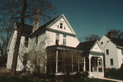 467 W 1ST ST, a Queen Anne house, built in New Richmond, Wisconsin in 1895.