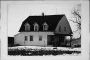BIRCH RD, W SIDE, .3 MI N OF IRIS LN, a Dutch Colonial Revival house, built in Baldwin, Wisconsin in .