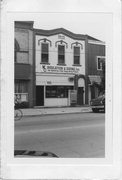 364 E MAIN ST, a Commercial Vernacular small retail building, built in Stoughton, Wisconsin in 1884.