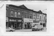 151 E MAIN ST, a Commercial Vernacular small retail building, built in Stoughton, Wisconsin in 1889.