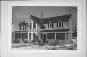 811-813 VINE ST, a Gabled Ell house, built in Hudson, Wisconsin in 1860.