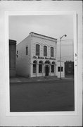 112 WALNUT ST, a Commercial Vernacular large retail building, built in Hudson, Wisconsin in 1857.