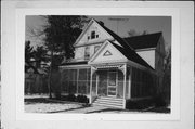 467 W 1ST ST, a Queen Anne house, built in New Richmond, Wisconsin in 1895.