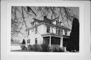 415 E 2ND ST, a Colonial Revival/Georgian Revival house, built in New Richmond, Wisconsin in 1907.