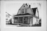 326 W 2ND ST, a Dutch Colonial Revival house, built in New Richmond, Wisconsin in 1900.