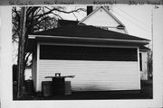 326 W 2ND ST, a Dutch Colonial Revival house, built in New Richmond, Wisconsin in 1900.