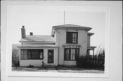 215 S GREEN AVE, a Italianate house, built in New Richmond, Wisconsin in 1875.