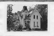 409 W SOUTH ST, a Queen Anne house, built in Stoughton, Wisconsin in 1886.