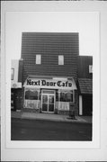 206 S KNOWLES AVE, a Commercial Vernacular small retail building, built in New Richmond, Wisconsin in 1900.