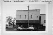 206 S KNOWLES AVE, a Commercial Vernacular small retail building, built in New Richmond, Wisconsin in 1900.
