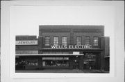 230 S KNOWLES AVE, a Commercial Vernacular large retail building, built in New Richmond, Wisconsin in 1900.