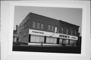 307 S KNOWLES AVE, a Commercial Vernacular large retail building, built in New Richmond, Wisconsin in 1899.