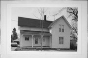 527 S KNOWLES AVE, a Gabled Ell house, built in New Richmond, Wisconsin in 1900.