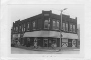 100-102 W MAIN ST, SW CNR OF MAIN AND SOUTH STS, a Commercial Vernacular bank/financial institution, built in Waunakee, Wisconsin in 1908.