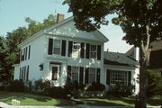 1231 N 6TH ST, a Greek Revival house, built in Sheboygan, Wisconsin in 1850.