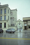 632 N 8TH ST, a Early Gothic Revival large retail building, built in Sheboygan, Wisconsin in 1886.