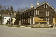 516-518 WATER ST, a Greek Revival boarding house, built in Sheboygan Falls, Wisconsin in 1837.