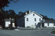 516-518 WATER ST, a Greek Revival boarding house, built in Sheboygan Falls, Wisconsin in 1837.