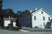 516-518 WATER ST, a Greek Revival boarding house, built in Sheboygan Falls, Wisconsin in 1837.