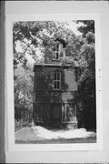 Huson, Henry H., House and Water Tower, a Building.