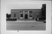 302 E MAIN ST, a Art/Streamline Moderne post office, built in Plymouth, Wisconsin in 1940.