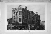 632 N 8TH ST, a Early Gothic Revival large retail building, built in Sheboygan, Wisconsin in 1886.