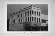 902 N 8TH ST, a Romanesque Revival retail building, built in Sheboygan, Wisconsin in 1892.