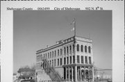 902 N 8TH ST, a Romanesque Revival retail building, built in Sheboygan, Wisconsin in 1892.