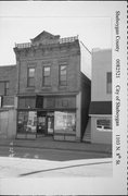 1103 N 8th St, a Queen Anne small retail building, built in Sheboygan, Wisconsin in 1884.