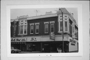 902 - 904 - 906 Michigan Ave, a Queen Anne retail building, built in Sheboygan, Wisconsin in 1890.