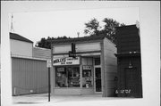 1003 Michigan Avenue, a Commercial Vernacular small retail building, built in Sheboygan, Wisconsin in 1895.