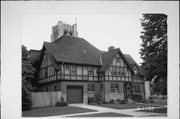 1125 N 6th St and 523 St Clair Ave, a Late Gothic Revival church, built in Sheboygan, Wisconsin in 1954.